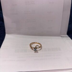 Elegant Gold Ring with Blue Gemstone